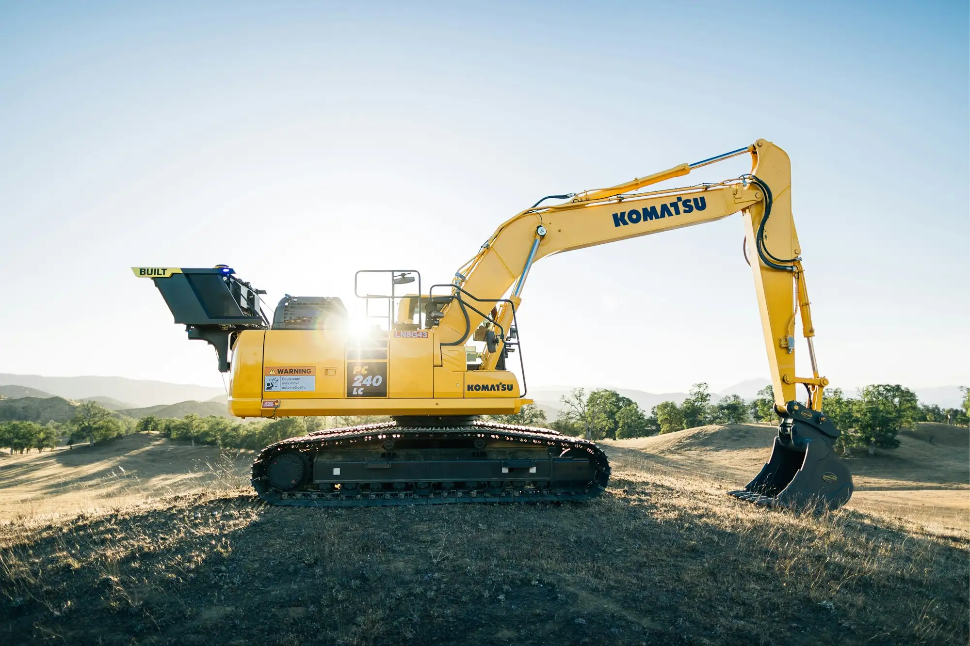 Excavator digging a site cut on an Australian residential block