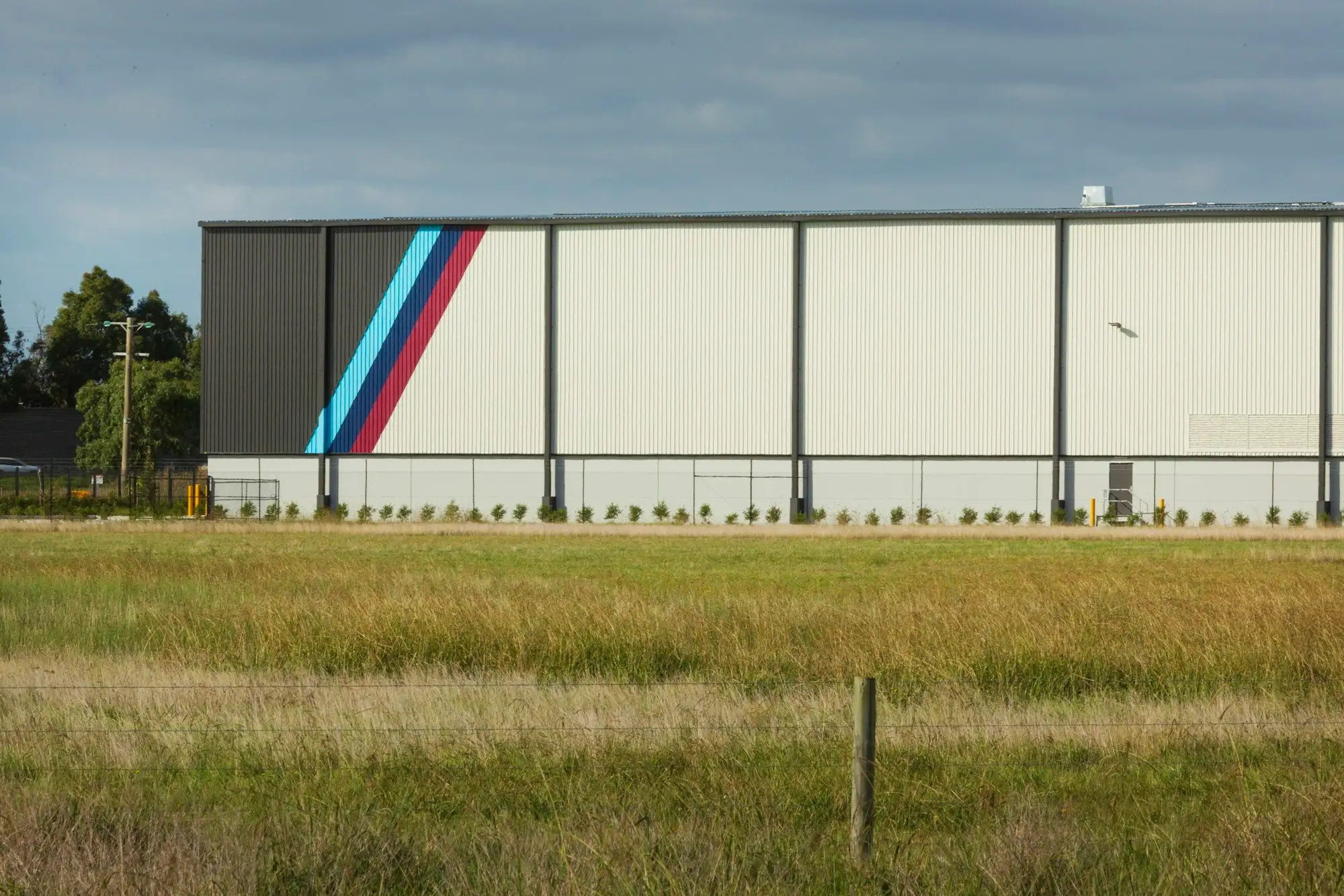 Small steel framed warehouse under construction on an Australian industrial block