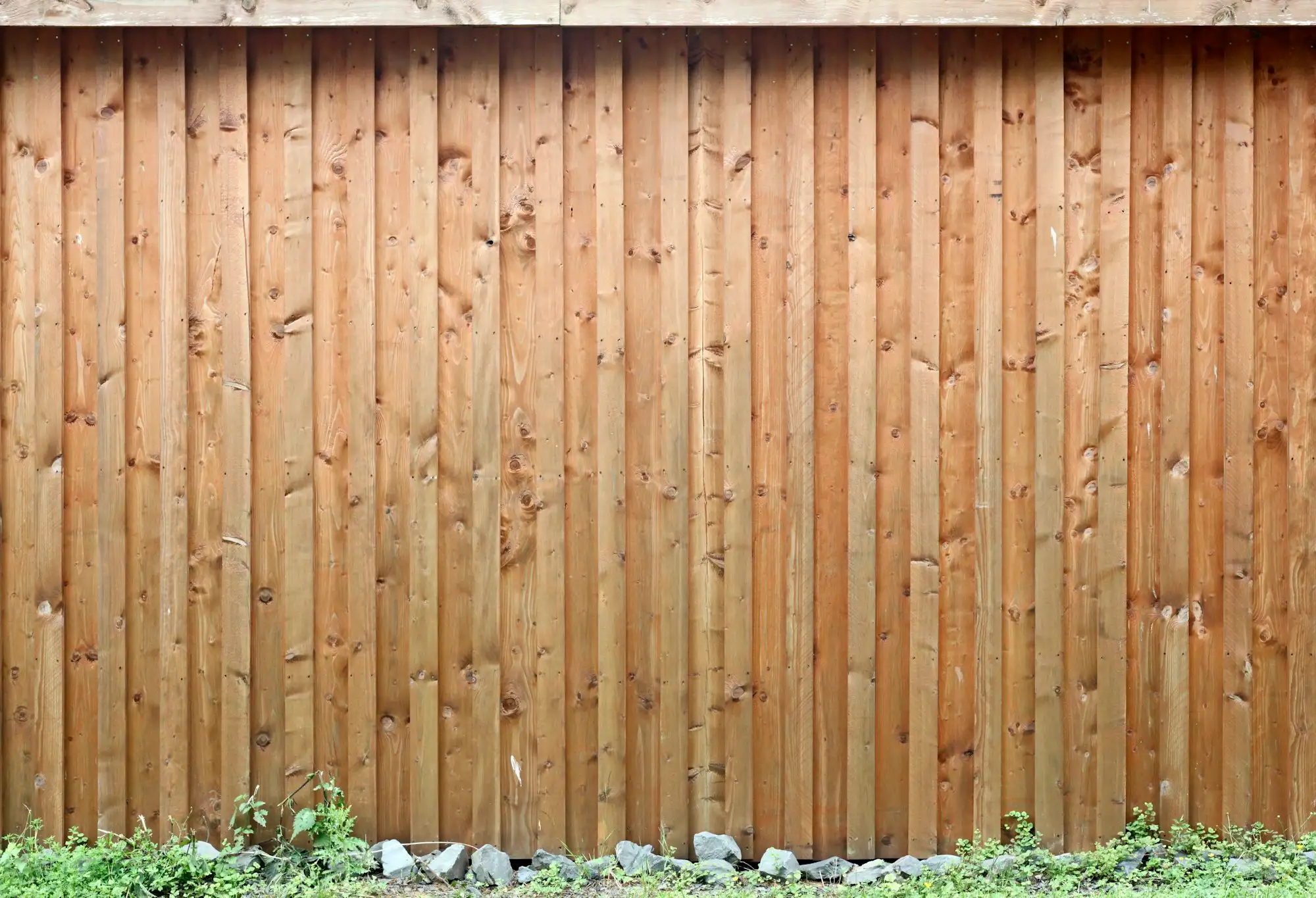 New timber paling fence along the boundary of an Australian home