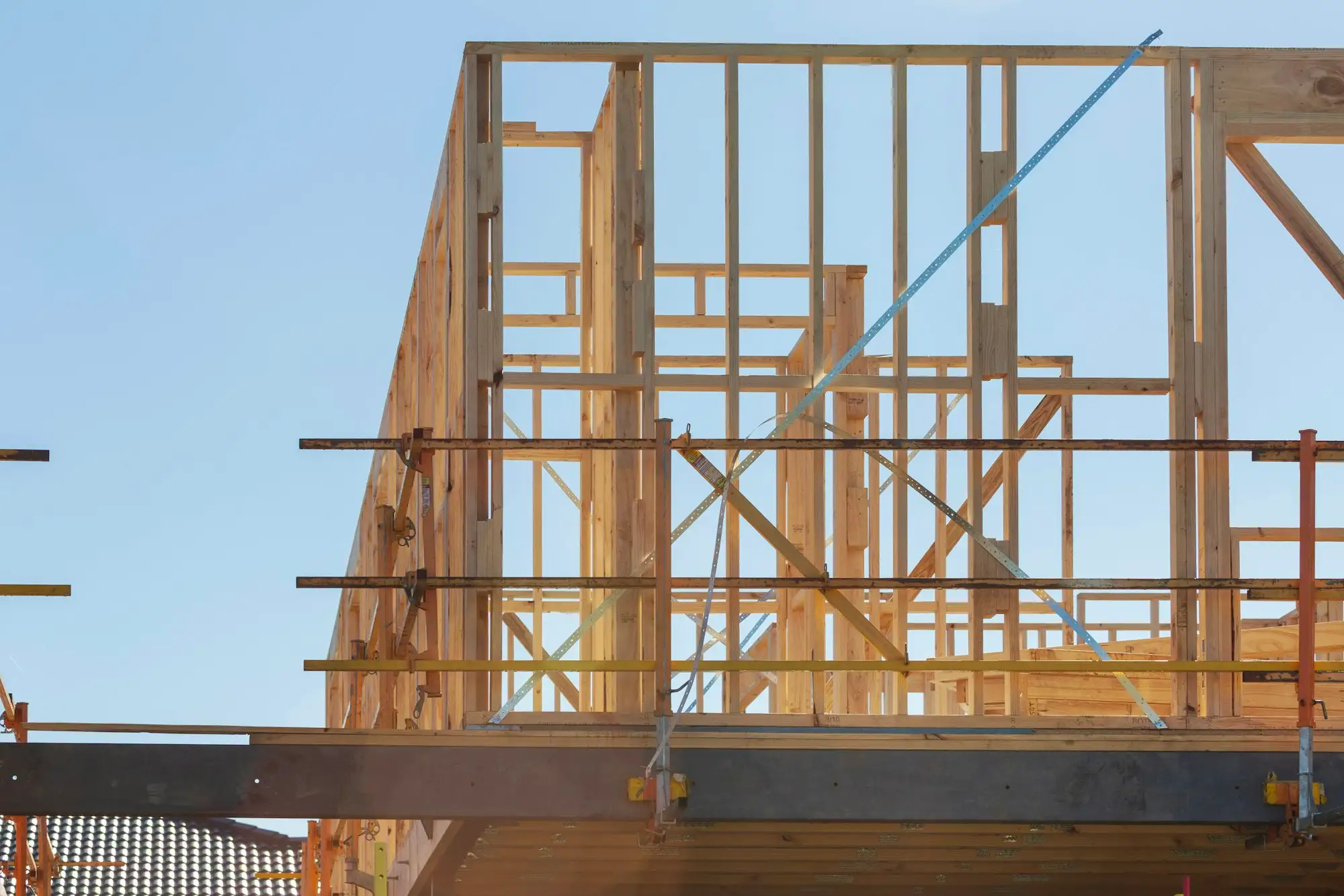 Scaffolding around a framed wall ready for external cladding