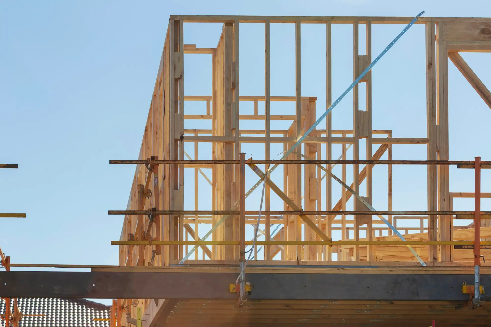 Scaffolding around a framed wall ready for external cladding