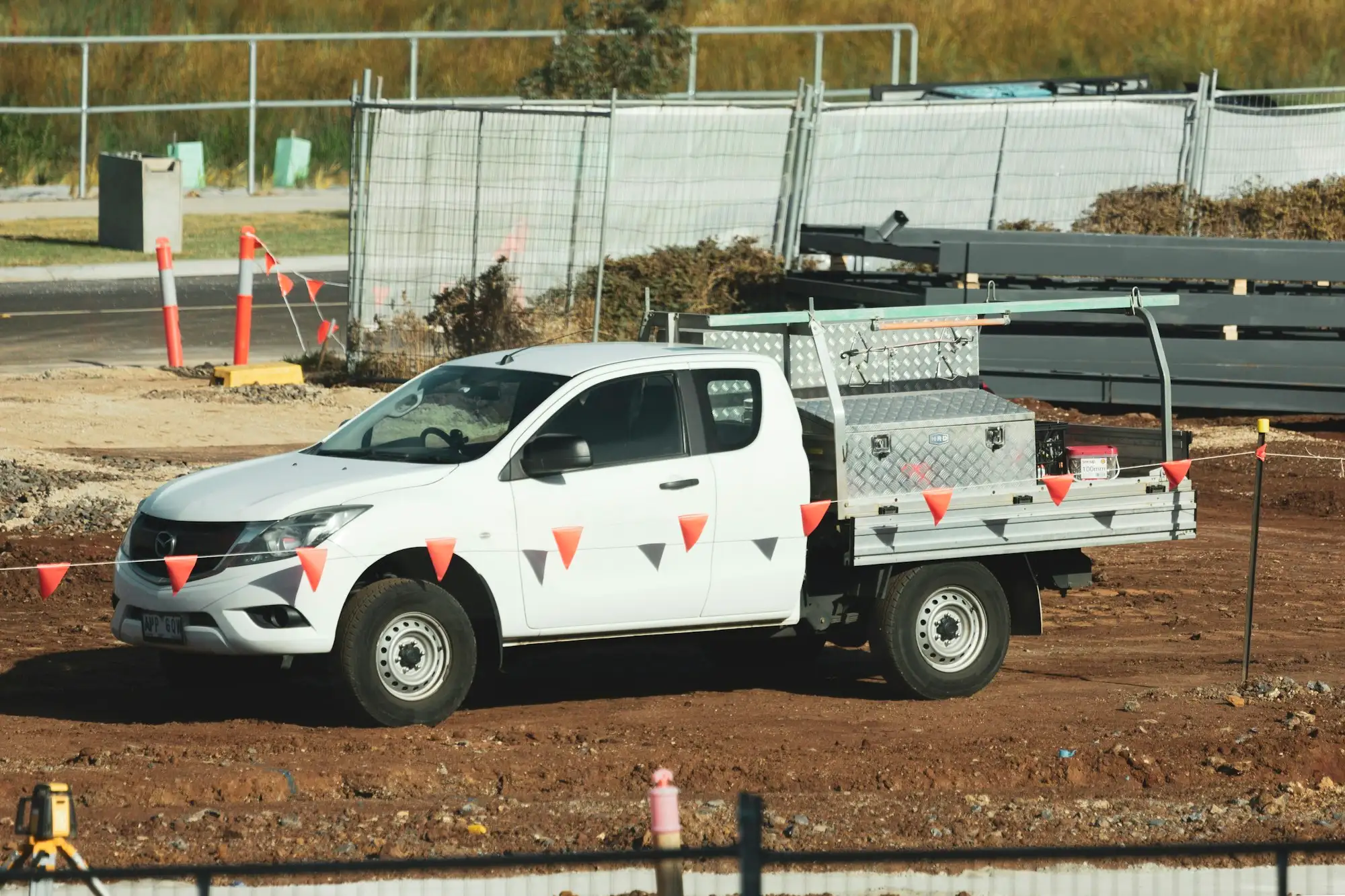 White ute parked on an Australian construction site